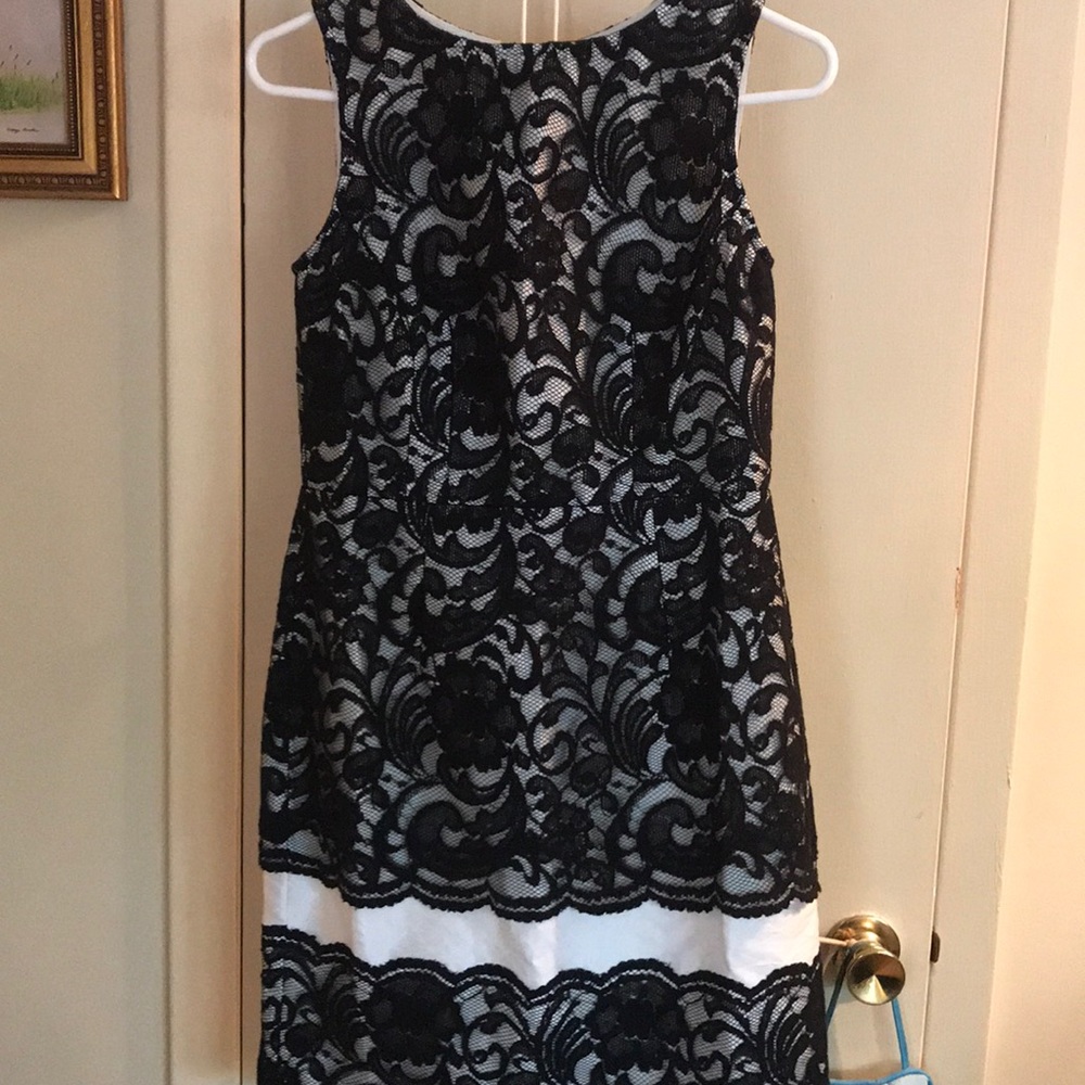 Black and off white colored limited dress size 4